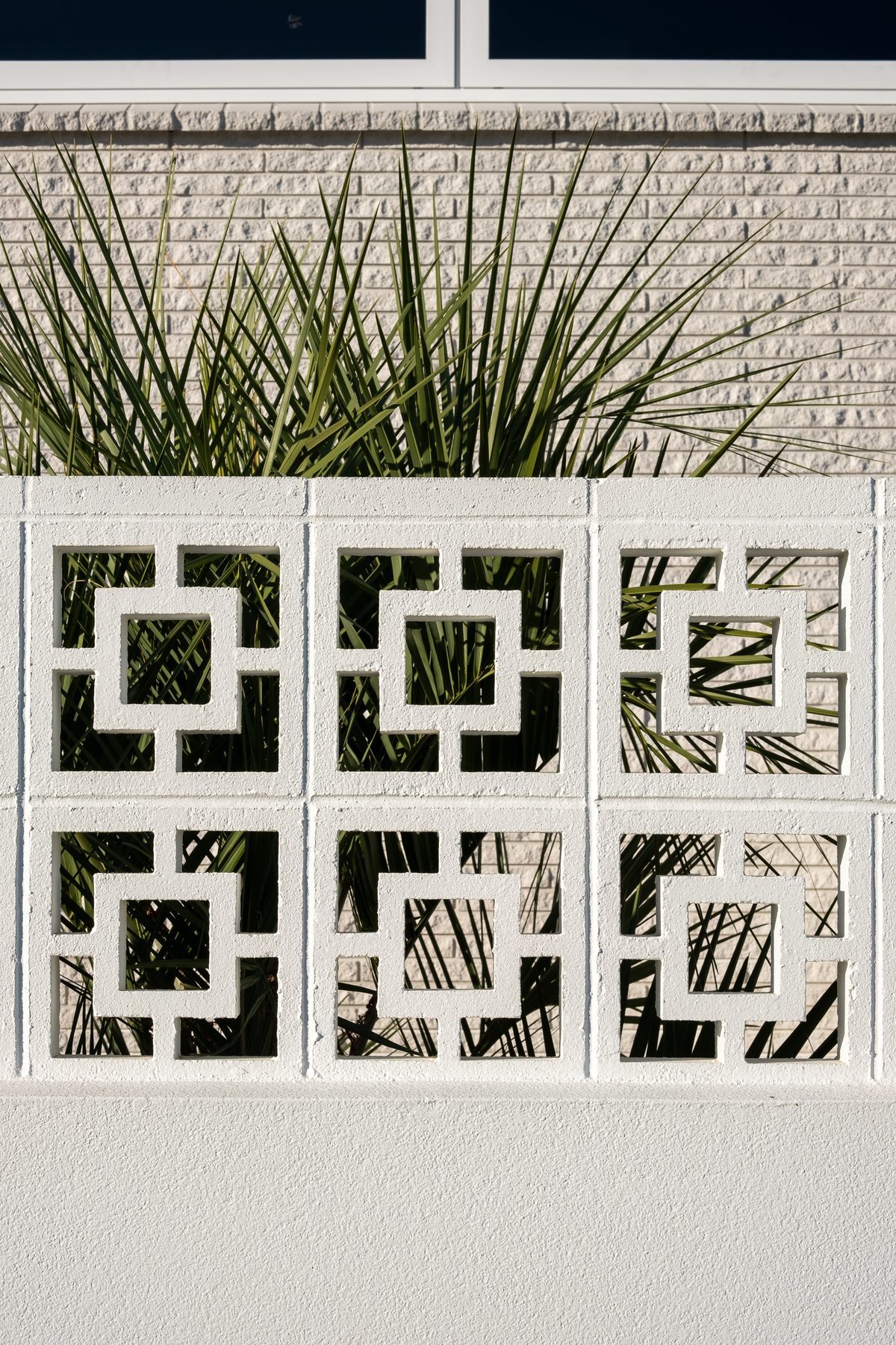 Expressive breeze blocks adding pattern and shade.