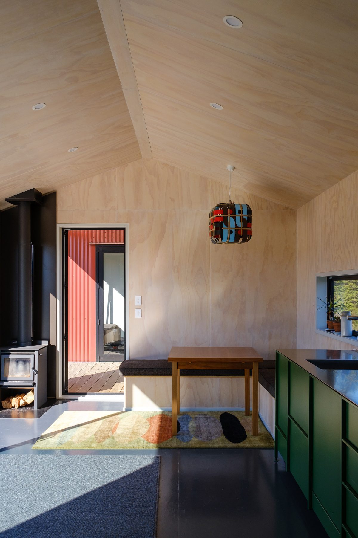 Dining within the warm timber interior.