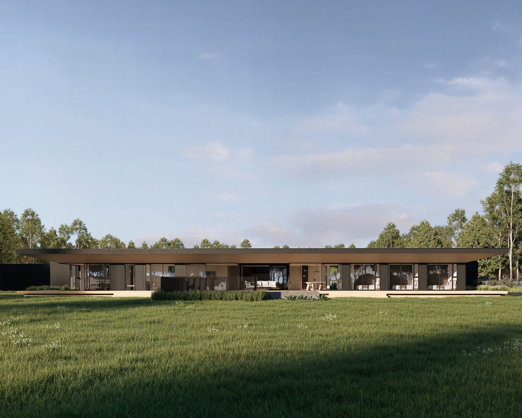 The long elevation across the lawn.